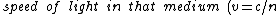 {\it speed of light in that medium}\ (v=c/n)